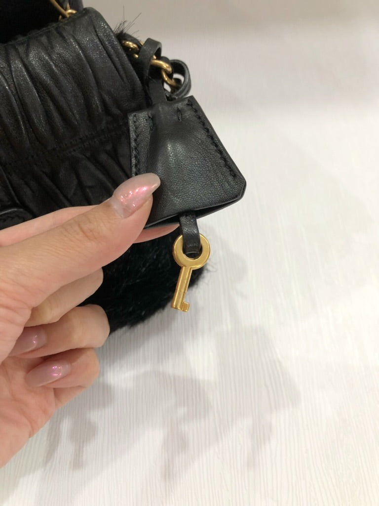 Prada fur sling bag
