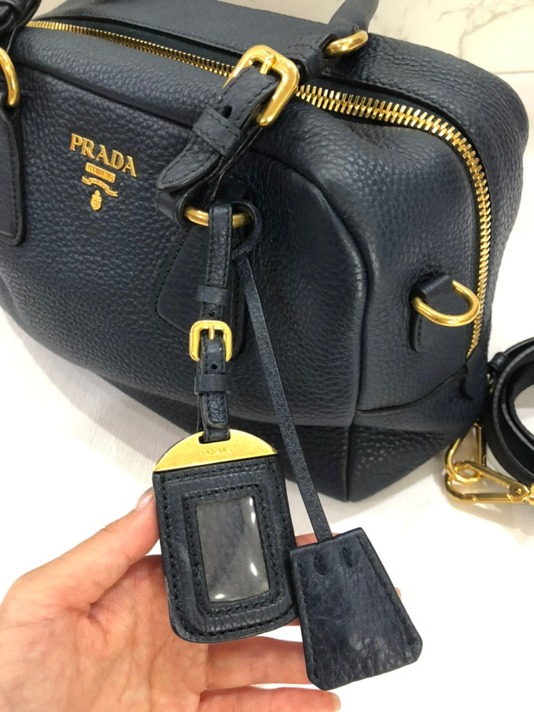 Prada leather shoulder bowling bag with long strap