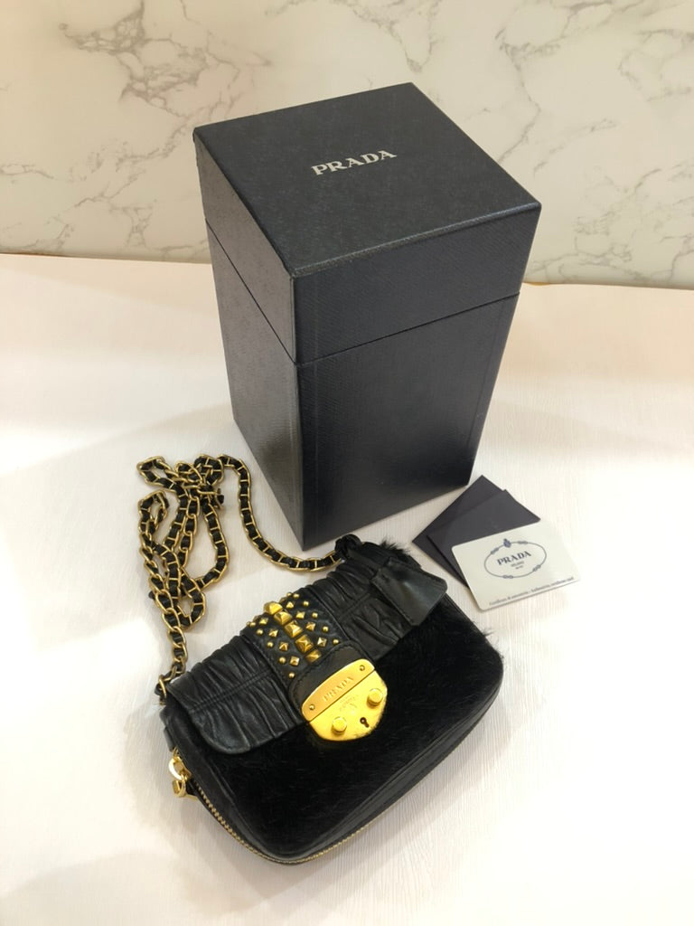 Prada fur sling bag