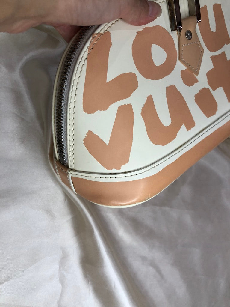 Louis Vuitton graffiti alma bag