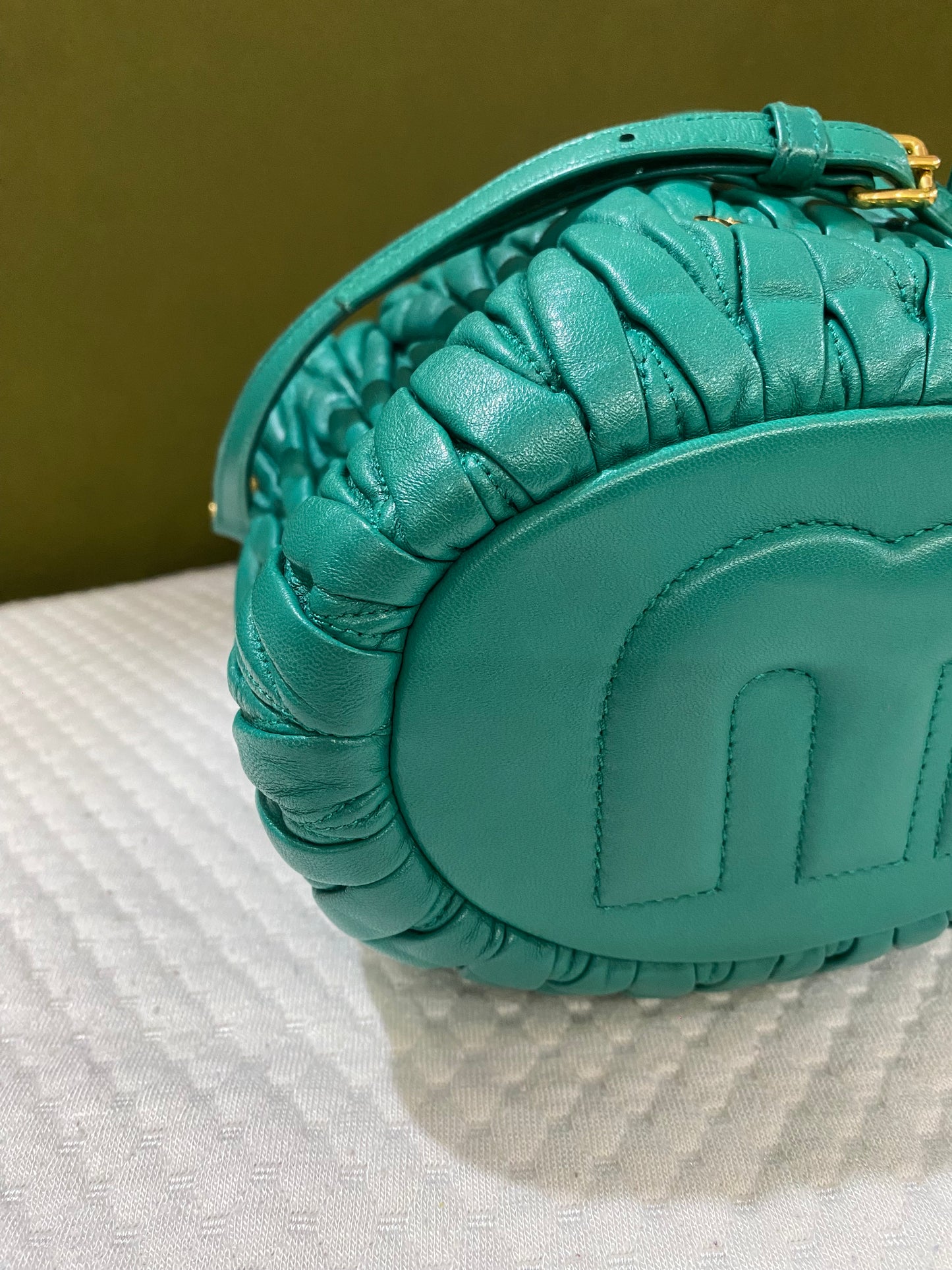 Miu Miu Matelasse Drawstring Mini Bucket Bag