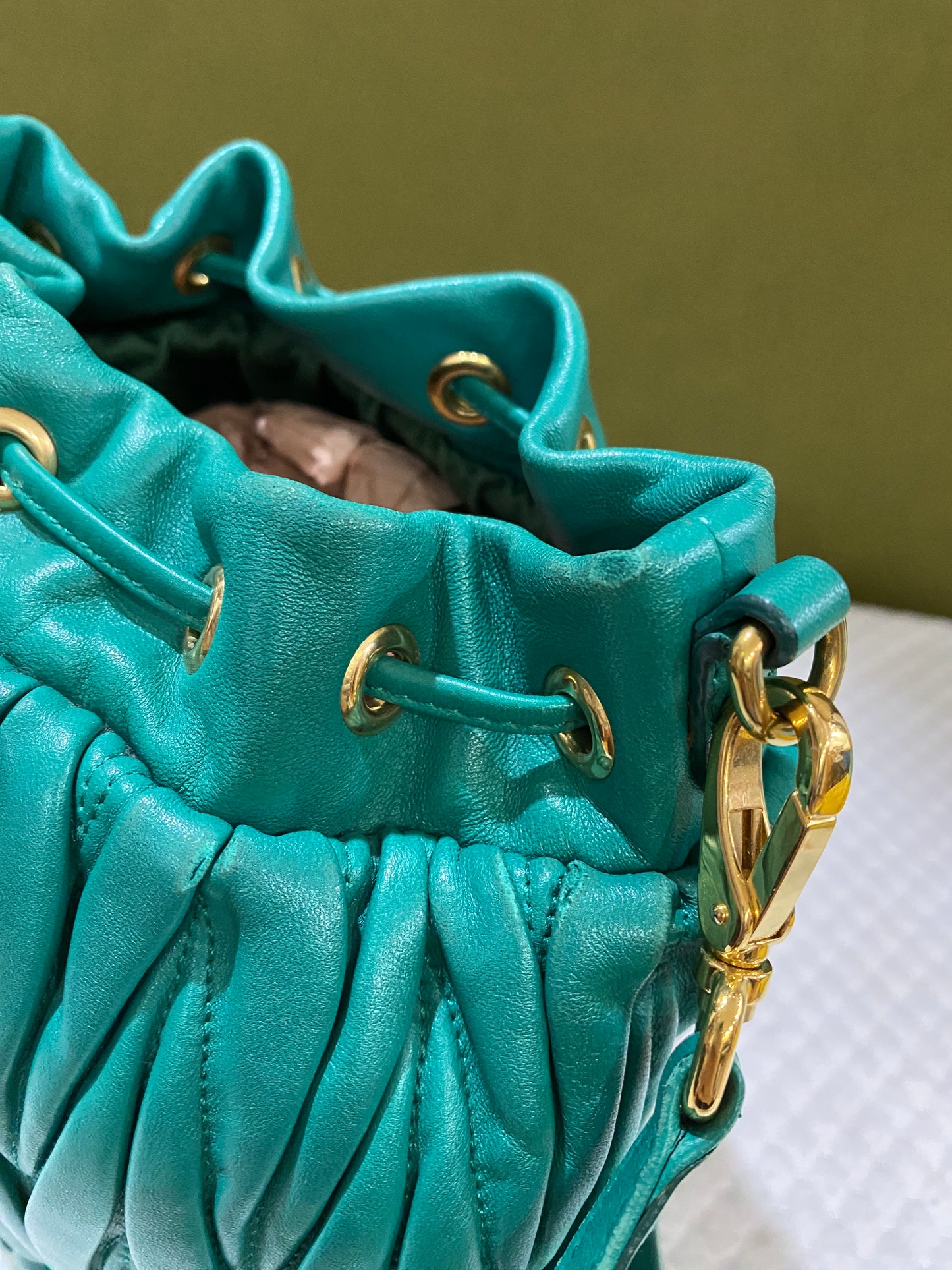 Miu Miu Matelasse Drawstring Mini Bucket Bag