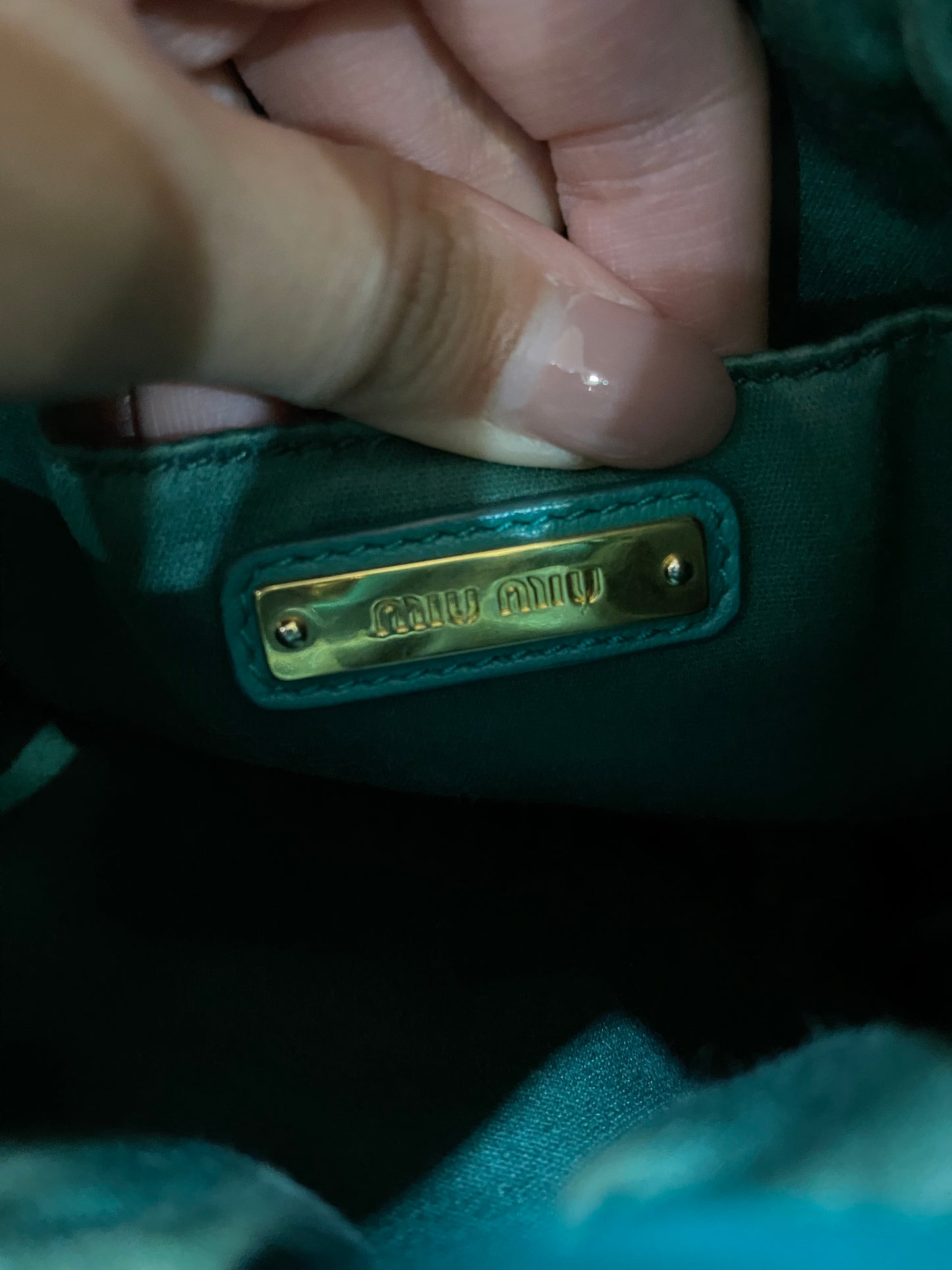 Miu Miu Matelasse Drawstring Mini Bucket Bag