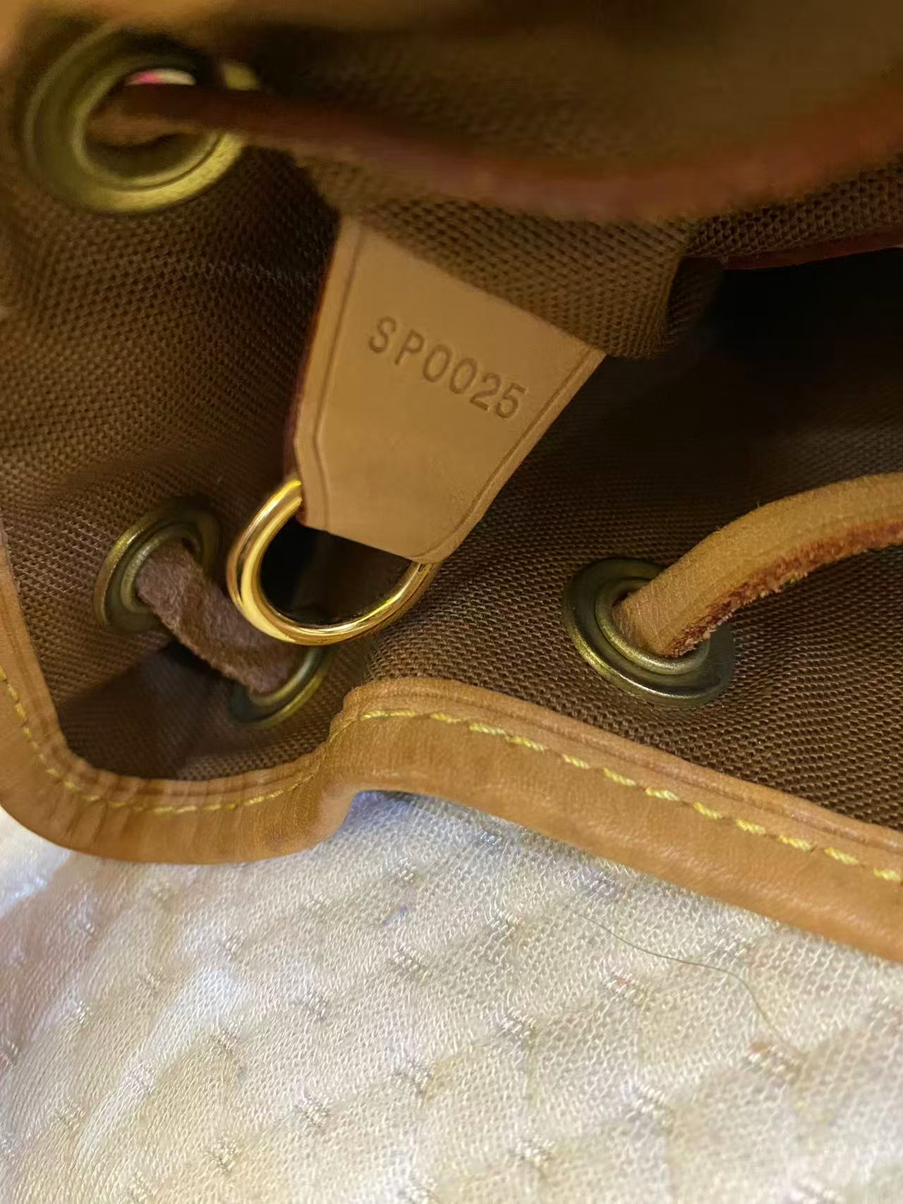 Louis Vuitton Backpack Montsouris MM in Brown Monogram Canvas