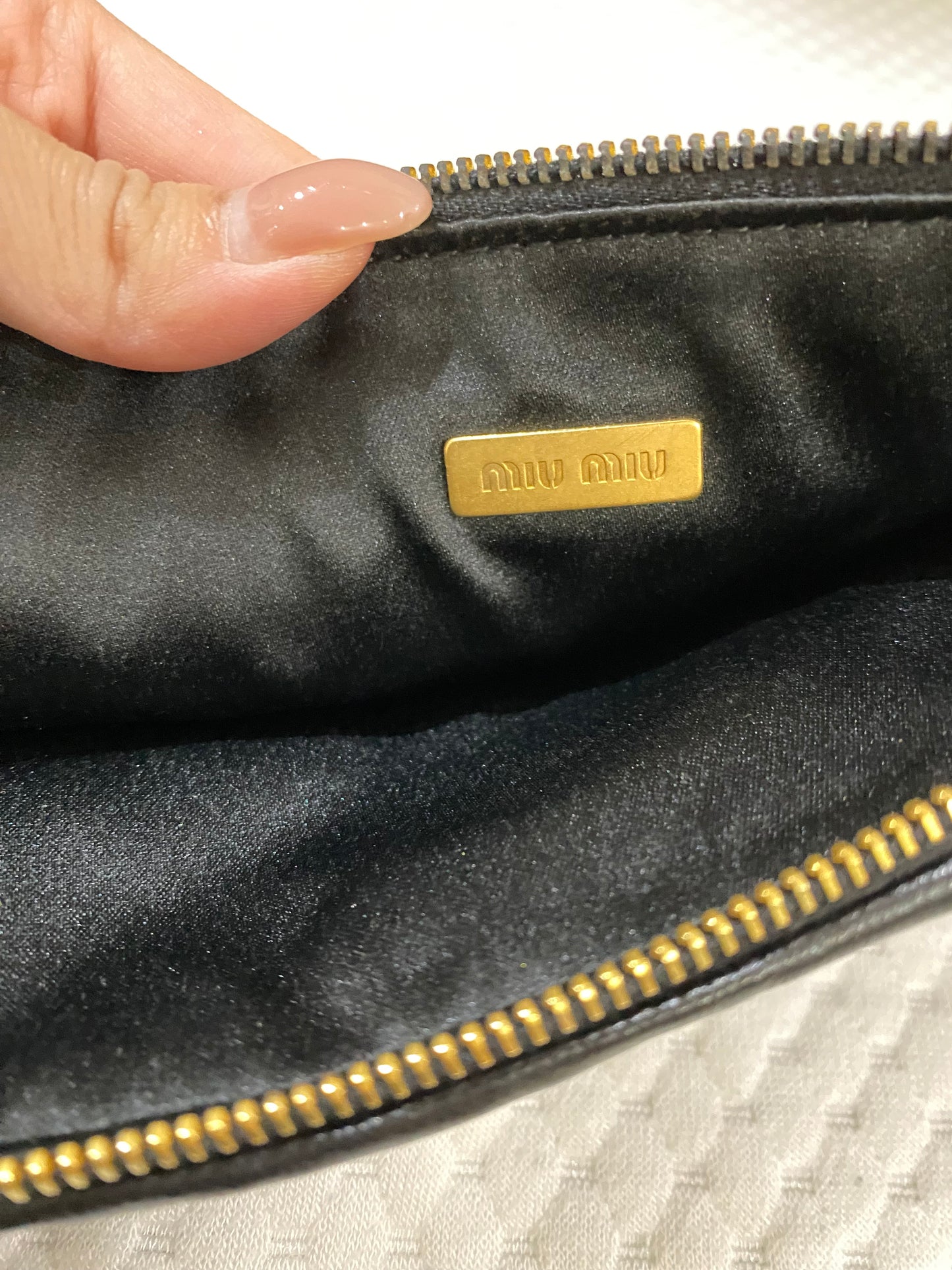 Miu Miu Leather Matelasse Clutch/ Pouch in Black