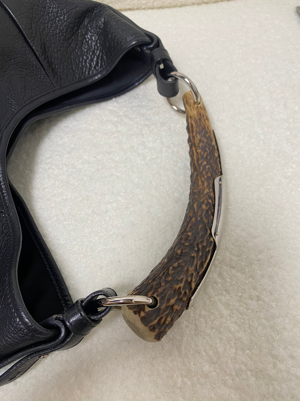 Yves Saint Laurent Calfskin Studded Logo Mombasa Hobo Black