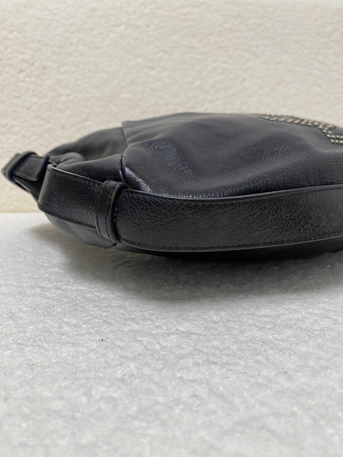 Yves Saint Laurent Calfskin Studded Logo Mombasa Hobo Black